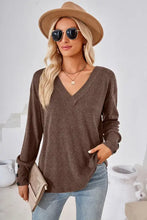 Long-sleeved V-neck brown sweater with dropped shoulder button cuffs