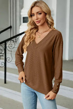 Women’s long-sleeved brown V-neck lantern sleeve T-shirt with button cuffs
