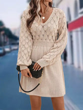 V-neck long sleeve sweater dress in beige with leaf pattern and fitted waist