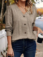 Ribbed knit V-neck long sleeve cardigan with three dark buttons