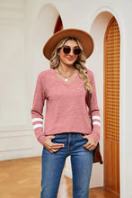 Women’s pink long sleeve V-neck T-shirt with white arm stripes