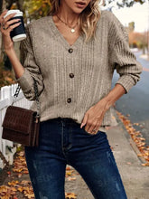 Beige ribbed knit V-neck long sleeve cardigan with brown buttons