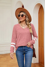 Women’s long-sleeve V-neck heather pink top with white arm stripes