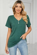 Women’s dark green short sleeve V-neck T-shirt with white buttons