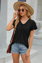 Women’s black V-neck short sleeve T-shirt with dropped shoulders