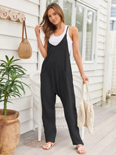 Schwarzer Jumpsuit mit Spaghettiträgern aus Baumwolle, verstellbare Träger, lockere Passform