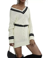 Cream-colored off-shoulder V-neck cable knit sweater dress with black trim