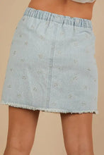 Light blue denim mini skirt with subtle embroidered bow details and frayed hem from VERY J casual denim mini skirt collection