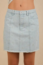 Light blue denim mini skirt with delicate white bow embroidery and frayed hem from VERY J bow printed casual denim mini skirt