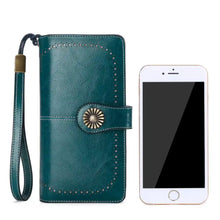 Vintage style teal leather long wallet with brass flower clasp and stitching