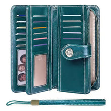 Vintage style teal leather long wallet with white stitching, card slots, ID window, silver sunburst clasp