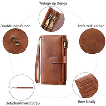 Vintage style brown leather wallet with zip design, snap closure, wrist strap