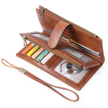 Vintage style brown leather wallet with zip compartments, card slots, wrist strap