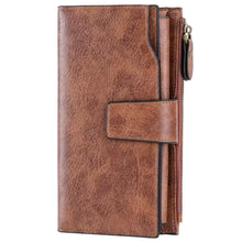 Vintage style long brown leather wallet with textured surface, side zipper, strap flap