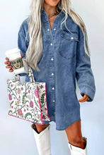 Denim dress with vintage wash featuring button front and chest pocket in classic blue vintage wash denim fabric