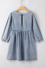 Light blue vintage wash denim dress with long sleeves gathered waist and pockets for casual wear
