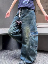 Vintage wash wide leg cargo jeans in dark-wash denim featuring wide legs and multiple functional pockets