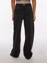 Black wide leg jeans with a vintage wash and classic back pockets shown from the back side