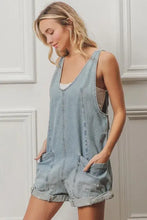 Vintage washed denim short overalls with V-neck, folded hem, and front pockets