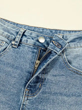 Blue denim vintage washed seam shift jeans featuring a classic five-pocket design and silver-toned metal zipper