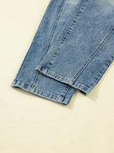 Vintage washed seam shift jeans in light-wash blue denim with a classic faded finish and visible seam stitching