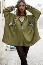 Olive green waffle-knit buttoned long sleeve hoodie with plaid accents and hood