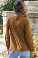 Women’s caramel brown waffle knit round neck long sleeve top with keyhole back