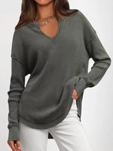 Olive green waffle knit long sleeve sweatshirt with v neck asymmetrical hem slightly stretchy machine wash cold tumble dry low