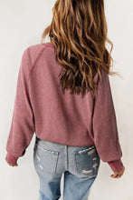 Womens mauve waffle knit raglan sleeve henley sweatshirt with distressed jeans