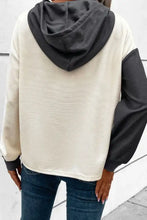 Waffle-knit two-tone long sleeve hoodie in off-white and dark gray