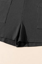 Waffle knit sleeveless U neck buttons romper with black textured shorts