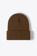 Brown ribbed knit beanie with folded brim, warm winter knit design
