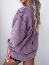 Wash slit round neck oversized sweatshirt in soft lavender with ribbed cuffs, machine wash cold and tumble dry low