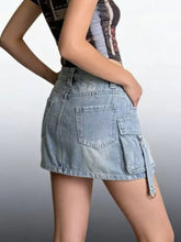 Light-wash denim skirt with cargo pockets and side slit in washed cargo denim for casual wear