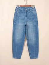 Light-wash blue denim high waist cuffed barrel jeans with straight-leg cut and two front buttons
