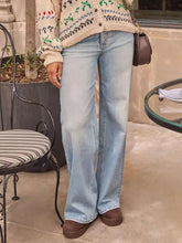 Light-wash denim wide leg jeans with a classic slightly worn look in a flare style for casual wear