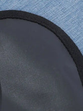 Blue denim edge with black stitching on waterproof pet car seat cover