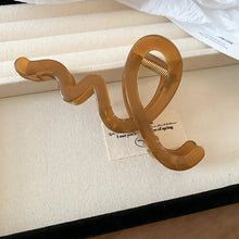 Translucent amber wavy acrylic hair claw clip