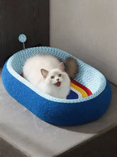 Blaues ovales Sisal-Kratzbett für Katzen mit gewebter Struktur und Regenbogenbesatz