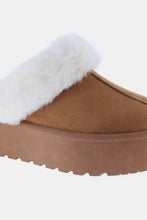 Tan suede platform snow slippers with white fur trim, 2-inch heel height