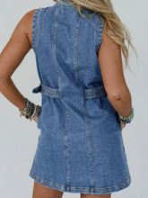 Blue sleeveless denim dress with belted waist and back pockets in Western belt button down sleeveless denim dress style