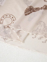 Cream-colored sheer scarf with brown and gray horse illustrations paired with slim fit mesh western print top