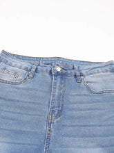 Light-wash denim whiskered wash cropped jeans with raw hem and classic five-pocket design and silver-toned button