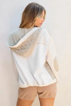 Beige and gray quilted hooded bomber jacket with scalloped hem