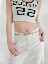 White leather metal belt with silver knot buckle metal and grommets