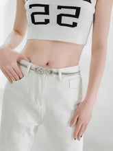 Silver concho metal belt with black accents and knot buckle metal