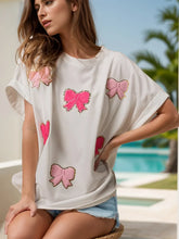 White Blouse with Pink Bow Appliqués