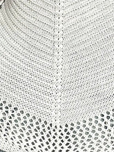 White lace shawl with openwork scoop neck and intricate diamond patterns