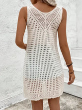 White sleeveless longline cardigan cover-up with crochet geometric pattern