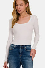 Womens white long-sleeve crop top with flattering neckline